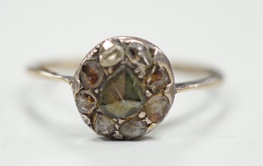 An antique yellow and white metal set rose cut diamond cluster ring, size S/T, gross weight 2.2 grams.